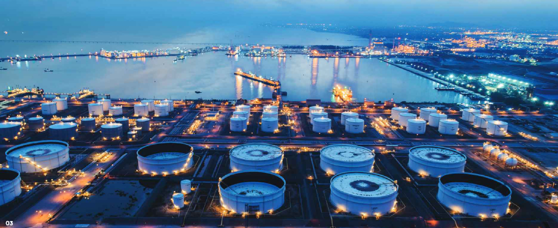 Night view of oil storage tanks at a terminal